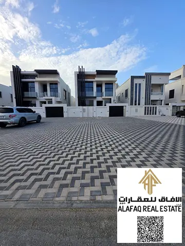 للبيع فيلا فاخرة في العامرة بعجمان 5 غرف نوم 7 حمامات تصميم عصري وتشطيبات عالية الجودة موقع متميز