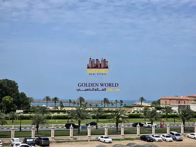 1-bedroom apartment with living room and balcony, first occupant in Al Qulaya, open sea view, luxury finishing, 1 bathroom, and a kitchen with a sea v
