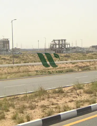 For Sale: Prime Commercial Plot in Al Ruwaiyat – Sharjah 🏢 Exceptional Investment Opportunity on the Main Street – Ideal for Offices, Shops, and Res
