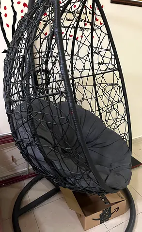 My  swinging chair with stand and cushion — used, good condition