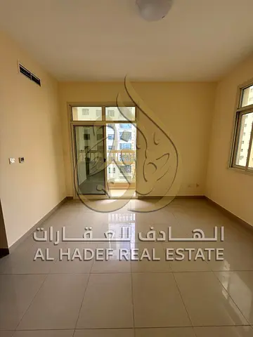 Prime Living Opportunity on Al Khan Main Street — 2 Bedroom Apartment with Separate Hall and Maid’s Room