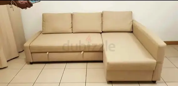 Beige L-shaped Sofa bed with - Good Condition