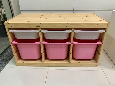 Wooden toy storage bench with 6 pink  white bins