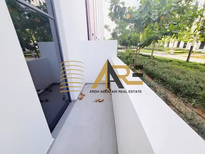 Spacious luxurious studio apartment with kitchen appliances and balcony