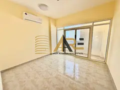 1 Bedroom with Bolcony in Brand new Building near Al Zahid city Center