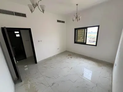 One bedroom and living room in Al Alia, prime location close to all services, easy access to Dubai and Sharjah roads.