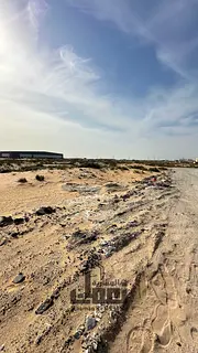 For investment, a prime land for sale in Al-Sajja Industrial 18 with an area of 41,650 sq ft, owned
