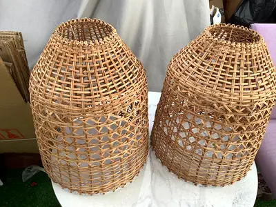 Pair of handwoven rattan pendant lampshades
