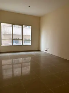 A well-maintained 2-bedroom apartment with a living room is available for annual rent in Al Majaz 2,