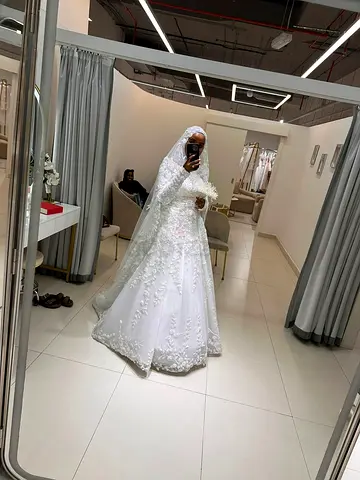 My white embroidered wedding dress with long veil