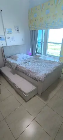 Single bed with pull-out trundle and upholstered headboard + 2 mattresses