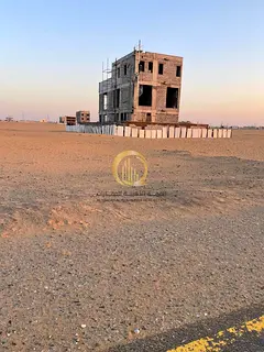 Two corner plots of land for sale in Al Zubair orchards, freehold ownership for Arabs, permit for gr