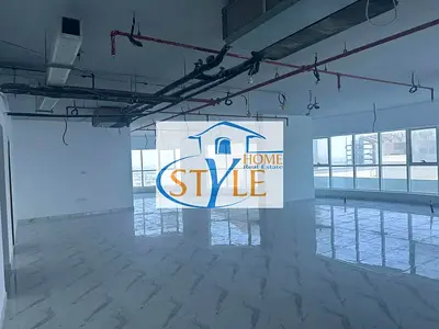 For rent: a spacious office with a sea view in Al Majaz 2, Sharjah, in an office tower from the best towers in Sharjah.
