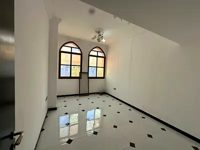 Two bedrooms, living room with balcony in Al Rawda 3, near Sheikh Ammar Street and Mohammed Bin Zayed Road exit