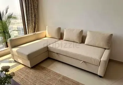 Ikea L Shape Sofa cum bed with big storage in L , and You can fix the L left and right any side
