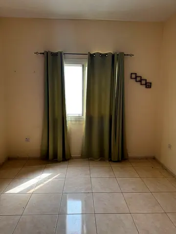 Olive-green grommet curtains — pair of panels, good condition