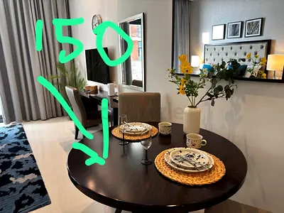My round dark wood dining table only without chairs (110cm diameter)