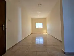 Three-bedroom apartment with a living room in Al Nuaimiya