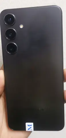 Black Samsung 24plus smartphone with triple rear cameras — good condition