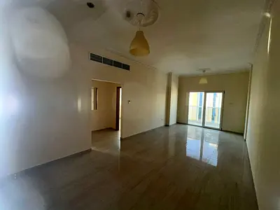 One bedroom, living room, two bathrooms in Al Rashidiya 3, Old Traffic Street, close to Ajman Corniche and the Sharjah and Dubai exits