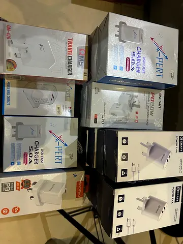 Multiple new boxed USB wall chargers — fast phone chargers