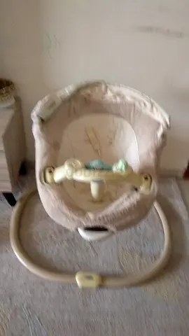 Lightly used baby rocker swing Electric