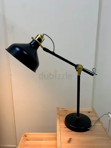 My adjustable black desk lamp with brass accents