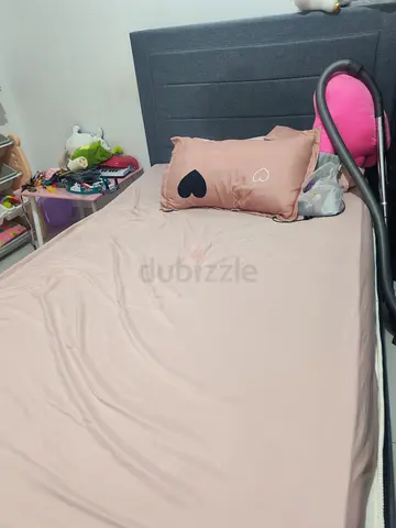 Single bed with grey upholstered headboard - used