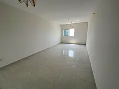 Two bedrooms, a living room, and three bathrooms. Second row from Ajman Corniche. Flexible payment o