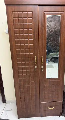 My wooden 2-door wardrobe with mirror  bottom drawer - good condition