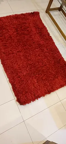 Red rug for lounge