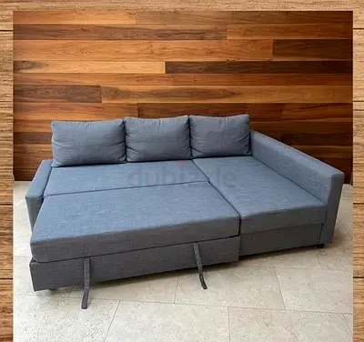 My grey L-shaped sofa bed (convertible pull-out)