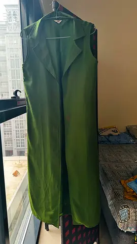 Long sleeveless green vest/duster