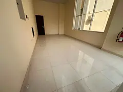 First-tenant shop in Al Nubai’a, new building, internal bathroom, AED 18,000 yearly, 4 payments, r