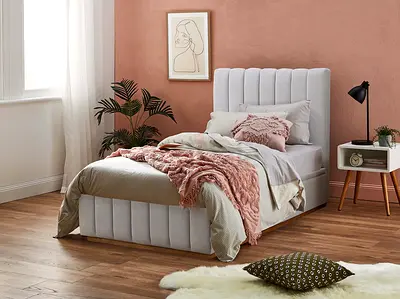 My light grey upholstered single bed with channel headboard