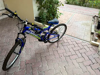 Blue Mountain Bike with Front Suspension - Good Condition