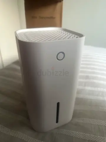 Compact white Dehumidifier — good condition