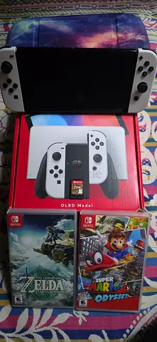 Nintendo Switch OLED (White) with Dock and 3 Games — Super Mario Odyssey  Zelda: Botw and totk