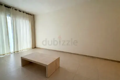 Low minimalist beige coffee table full travertine