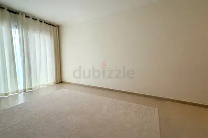 Neutral beige solid area rug, lightly used