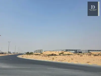 Industrial corner plot for sale on the main road / Freehold for all nationalities / Ready for construction / Opposite Block 7, Al Sajaa area (Emirates