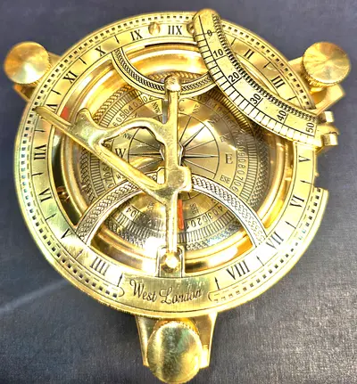 Beautiful  vintage  brass compass with sun timer in wooden  box from london  for sale.