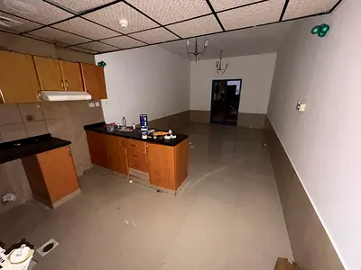 Luxury studios for annual rent in Tower C, Ajman. Central air conditioning, maintenance included, balcony with excellent views, free parking.
