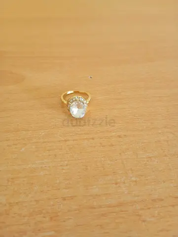 Elegant Gold Ring with Center Stone