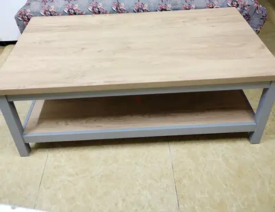 Light oak coffee table with lower shelf