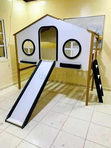 Wooden kids playhouse loft with slide and ladder - used, good condition