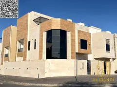 Corner villa for sale in Al Helio 2 Ajman 6 master bedrooms with majlis 2 living rooms kitchens roof