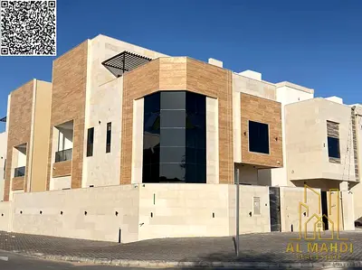 Corner villa for sale in Al Helio 2 Ajman 6 master bedrooms with majlis 2 living rooms kitchens rooftop and yard registration included