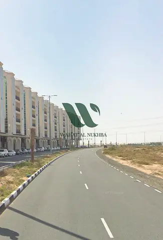🏢 للبيع أرض تجارية في الشارقة – منطقة تلال