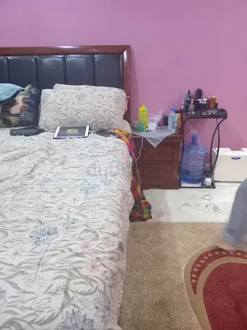 Bed with a side table